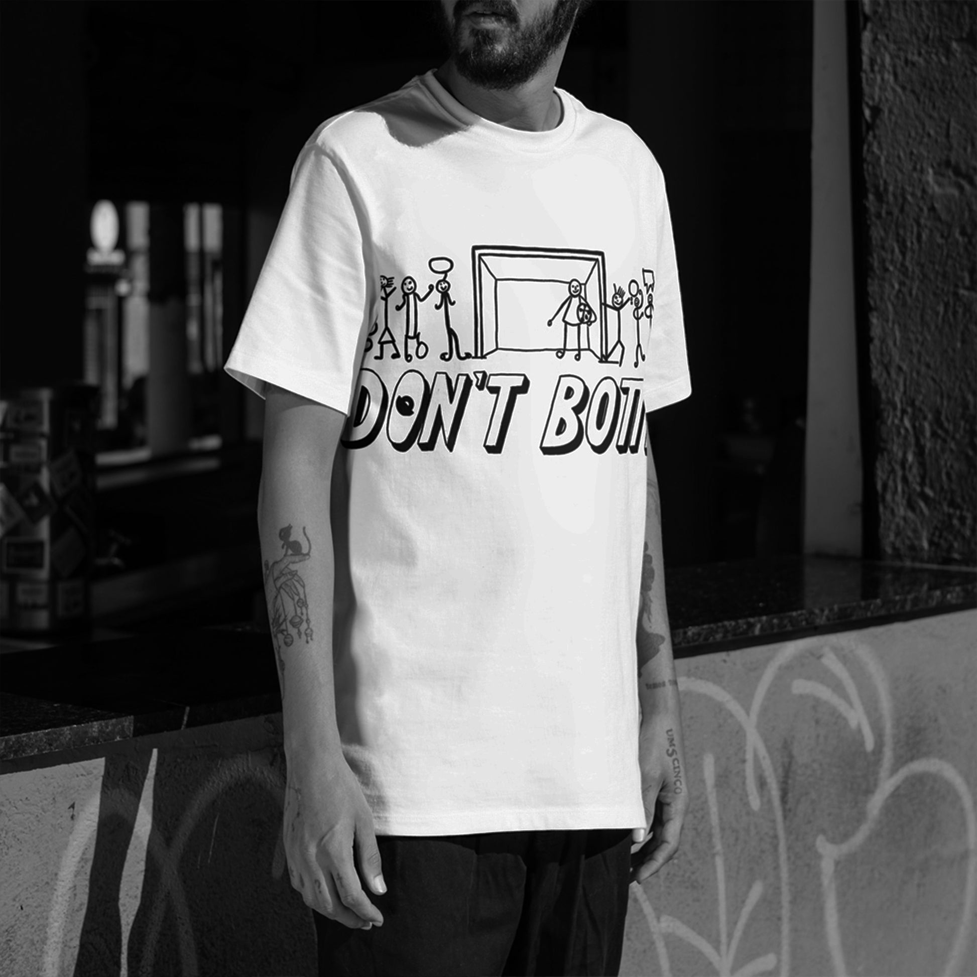 Front close-up of Don’t Bottle white unisex cotton t-shirt — round neck minimal streetwear.