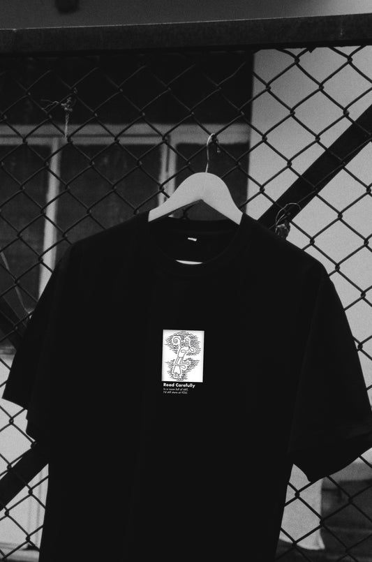 The Ogler black oversized t-shirt by Blaknwhite — front view”