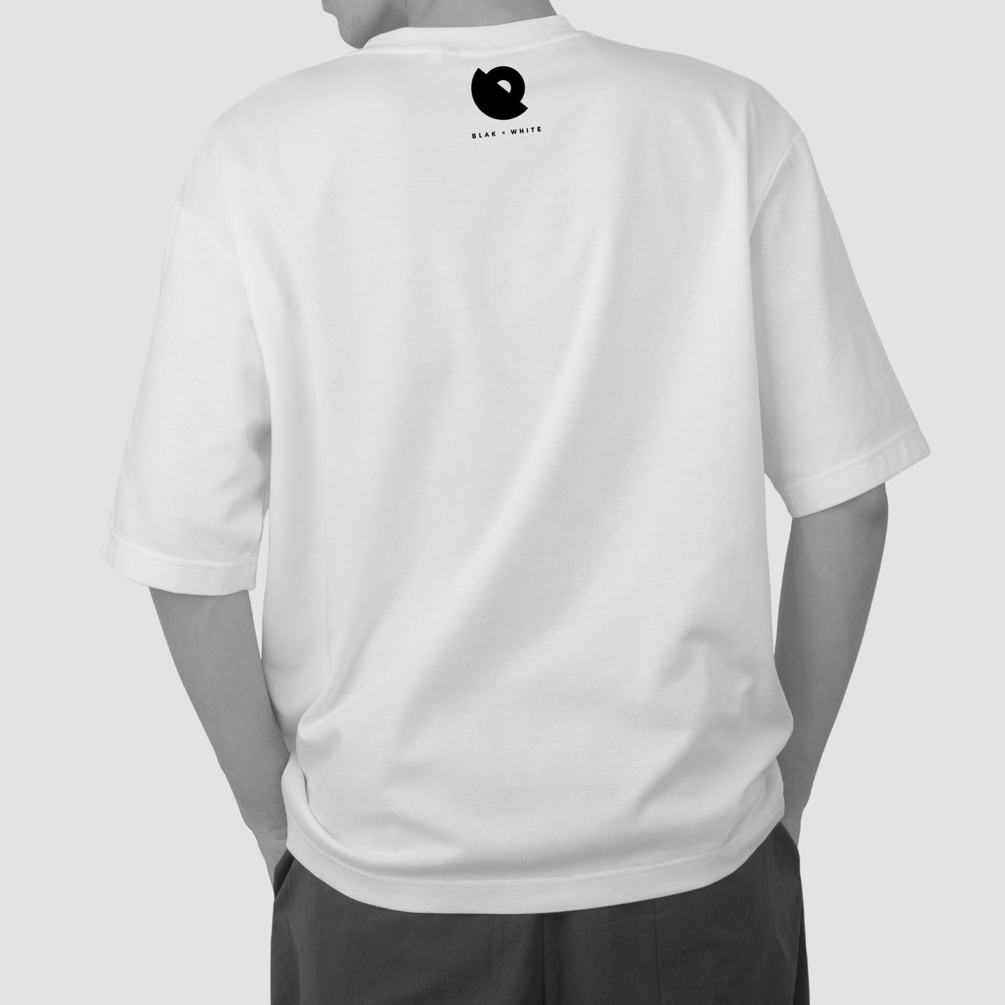 Back print of The Ogler White — art-inspired oversized streetwear by Blaknwhite
