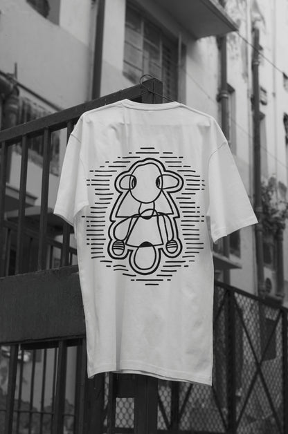 Oversized white t-shirt with a round neck and short sleeves, featuring a black and white line art design of a figure on the front.