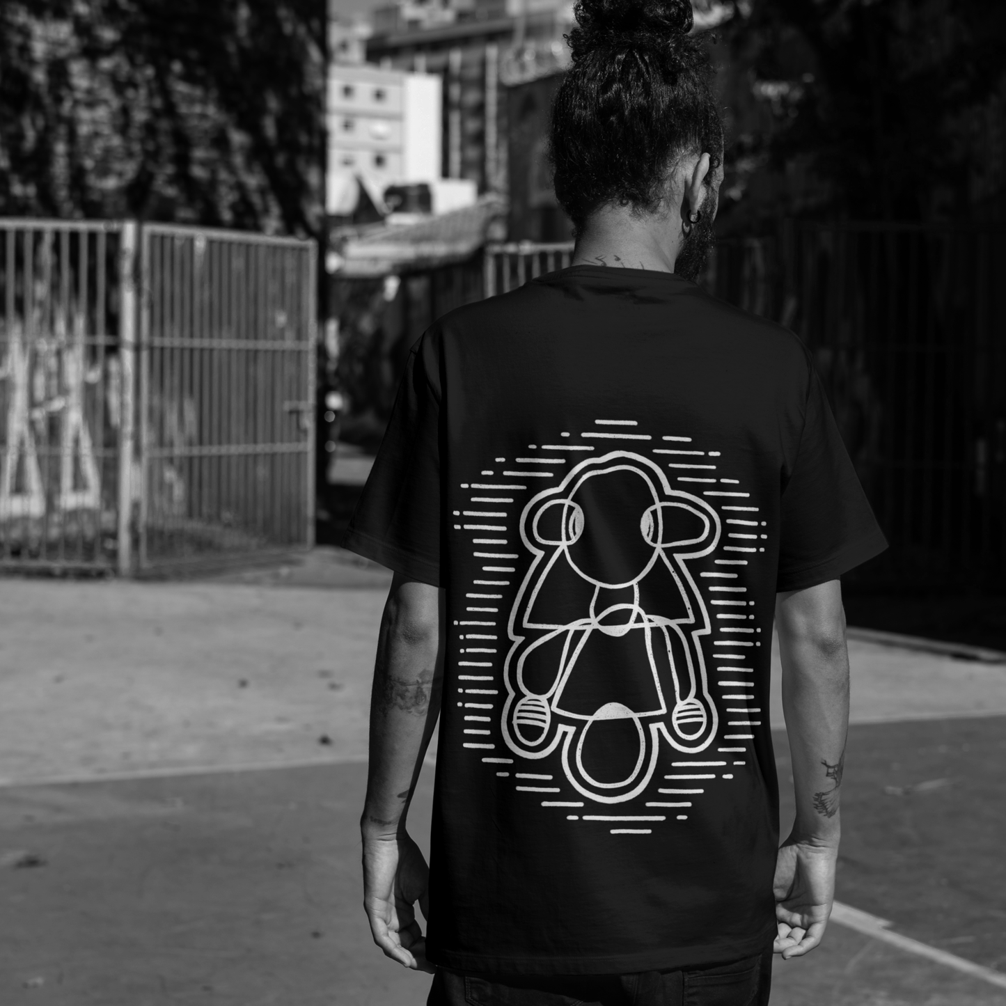 Back design of The Wondering Soul black oversized t-shirt — artistic print inspired by dreamers.